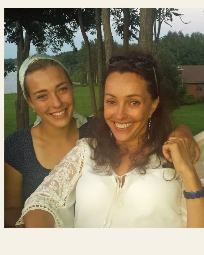 A mother and her grown daughter outdoors - the photograph, and the painting made from it