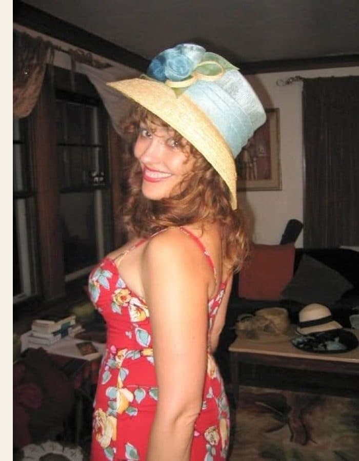 A woman in a straw hat in a cluttered room - the photograph, and the Klimt portrait painted from it